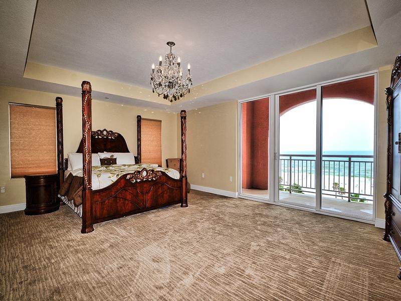 Grand master bedroom has beautiful beach view with access to the balcony.
